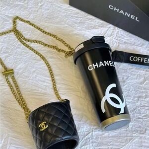 Chanel GWP Novelty Black, with quilted vegan leather.Crossbody carrying case.